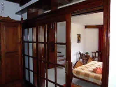 Schlafbereich Wohnung 4: Immobilien Teneriffa: Verkauf renovierte Finca mit EFH in bester Lage von Puerto de la Cruz / Teneriffa