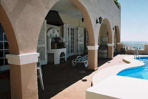 Terrasse mit Pool: Verkauf einer Luxus Villa auf Teneriffa / Costa Adeje / San Eugenio Alto: Exklusive Villa, Nähe mehrerer Golfplätze, unverbaubarer Panoramablick auf Gomera und La Palma