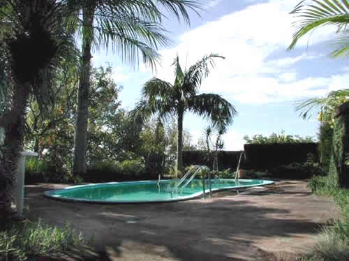Poolbereich mit Garten : Immobilien Porto Alegre / Rio Grande do Sul : Verkauf Haus in Porto Alegre mit Traumsicht auf Stadt und Fluss