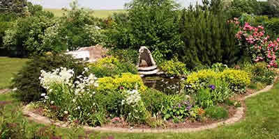 Garten mit Teich: www.iim.de/Exklusiv-IB/oesterreich/verkauf/villa-vorarlberg/index.htm